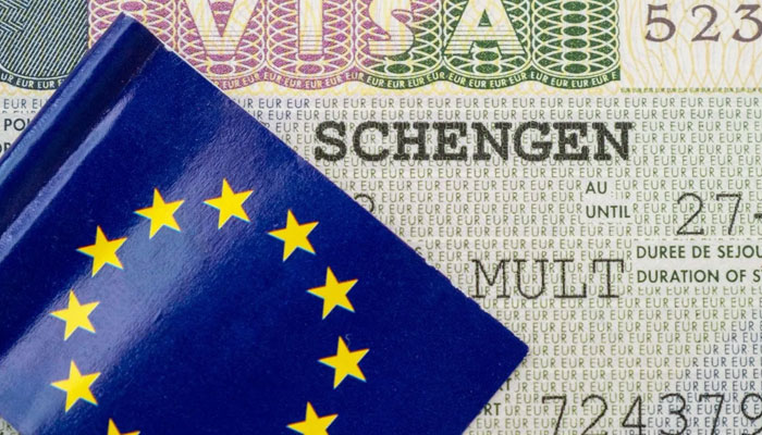 A representational image of an Schengen visa issued on a passport. — Travel and Leisure Asia