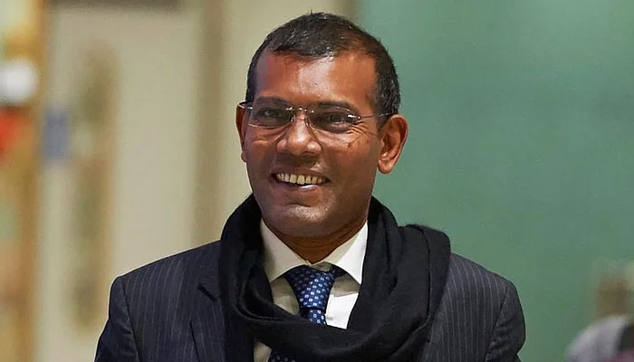 Former Maldives president Mohamed Nasheed arriving at Heathrow airport in London. — AFP