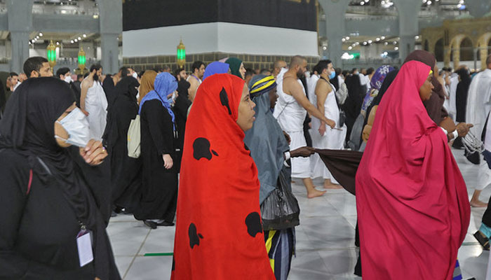 Muslim pilgrims circumambulate the Kaaba at the Grand Mosque, in Saudi Arabias holy city of Makkah on July 6, 2022. —AFP