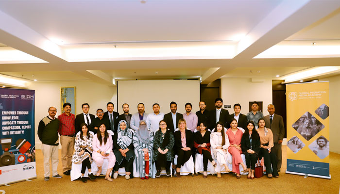 The image shows a group photo after Training on “Ethical and Victim-Centered Reporting on Trafficking in Persons (TIP) and Smuggling of Migrants (SOM), conducted by the International Organization for Migration IOM Pakistan in collaboration with Global Migration Media Academy GMMA, and Sustainable Social Development (SSDO), funded by Ministry of Foreign Affairs Denmark. —Facebook/SSDO