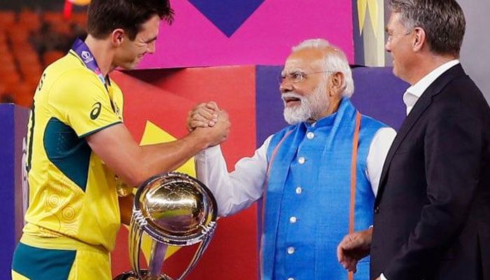 Indian prime minister Narendra Modi greets Australia captain Pat Cummins after handing over the ICC World Cup his side beat hosts India by 6 wickets in the final match at Narendra Modi Stadium in Ahmedabad, India, on Sunday, November 19, 2023. Australian deputy prime minister Richard Marles also seen. —ANI