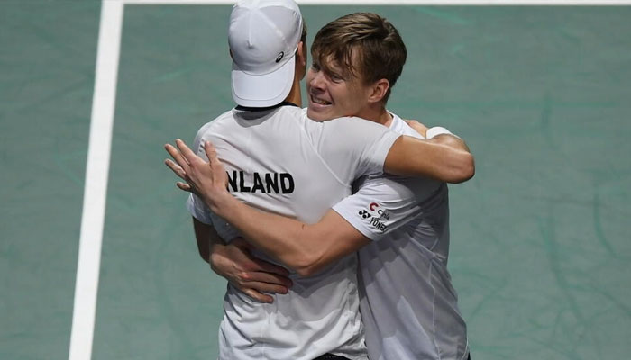 Finlands Harri Heliovaara (R) and Otto Virtanen celebrate after winning the decisive doubles match against Canada to reach the Davis Cup semis. — AFP File