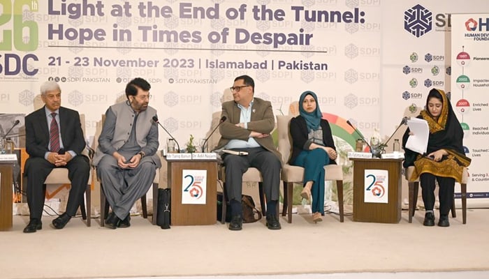 Panelists interact during the Sustainable Development Conference 2023 in Islamabad on November 22, 2023. — Facebook/Human Development Foundation