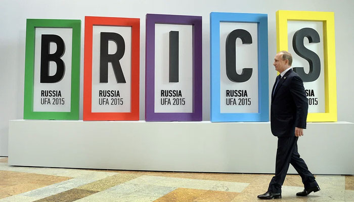 Russias President Vladimir Putin arrives for a welcome ceremony in Ufa on 9 July 2015 at the start of the 7th BRICS summit. Leaders of the BRICS. — AFP