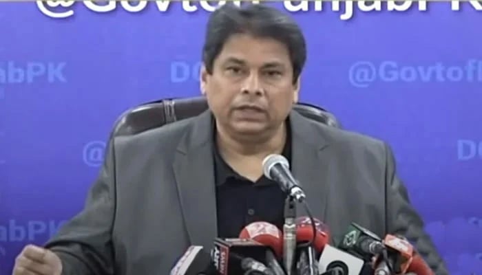 Caretaker Punjab Minister for Information and Local Government Amir Mir speaks with the media in this still. — YouTube/Geo News