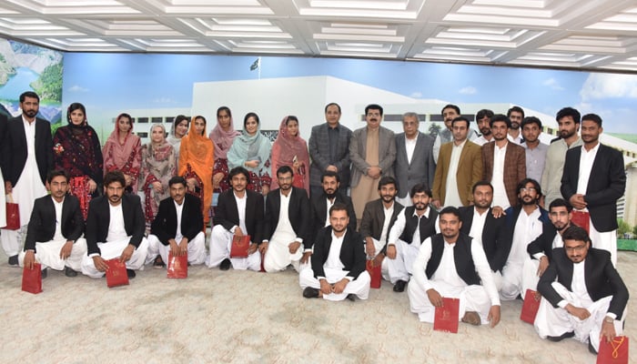 A group photo shows a delegation visiting Senate Chairman Muhammad Sadiq Sanjrani in Islamabad on November 23, 2023. — @OfficeSenate