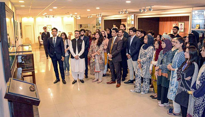 A group of students and faculty members of Air University, Islamabad visiting Senate Museum at Parliament House on Nov 24, 2023. — APP
