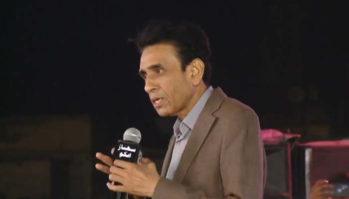 MQM-P Convener Dr Khalid Maqbool Siddiqui addresses a public gathering in Korangi Town on November 26, 2023, in this still. — Facebook/MQM ( Muttahida Quami Movement)