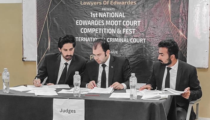 Students can be seen acting as the judges during the first ‘National Moot Court Competition’ at Edwardes College Peshawar on November 24, 2023. — Facebook/Edwardes College Peshawar