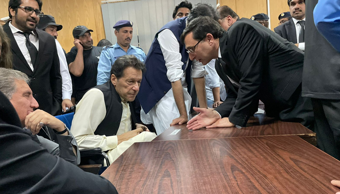 Barrister Gohar Ali Khan speaks with the Chairman PTI Imran Khan in this image released on May 4, 2023. — Facebook/Barrister Gohar Khan