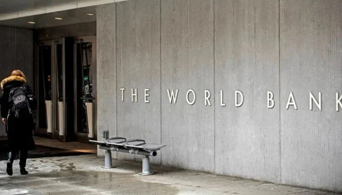 A person enters the building of the Washington-based global development lender, The World Bank Group, in Washington. — AFP