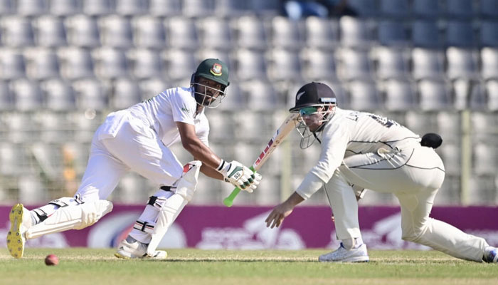 Bangladesh’s Najmul Hossain Shanto (L) plays a shot. — AFP