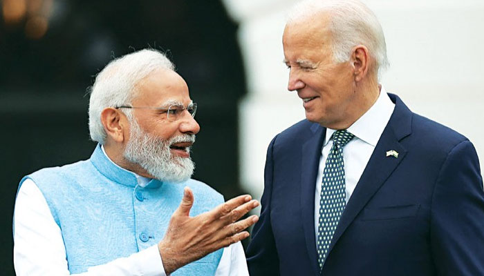 President Joe Biden and Indian prime minister Narendra Modi talk during an arrival ceremony at the White House on June 22, 2023 in Washington, DC. — AFP