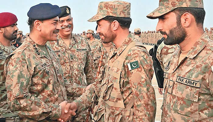 RAWALPINDI: Chief of Army Staff General Syed Asim Munir meets troops at Khairpur Tamewali on Saturday.  — ISPR