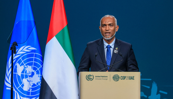 Maldives President Mohamed Muizzu speaks during the High-Level Segment for Heads of State and Government session at the United Nations climate summit in Dubai on December 1, 2023. — AFP