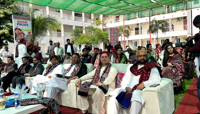 This image shows IG Sindh (2nd-L) sitting during a function organised at the Central Police Office on the occasion of the Sindhi Culture day.