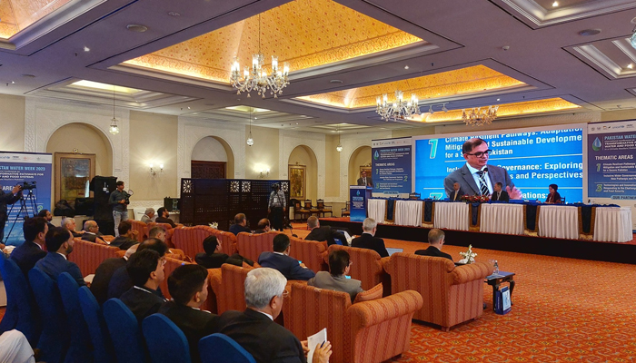 This image shows a speaker addressing the audience during a three-day international conference on ‘Transformative Pathways for Water and Food Systems in Climate-Resilient Pakistan’ on December 4, 2023. — Facebook/IWMI Pakistan