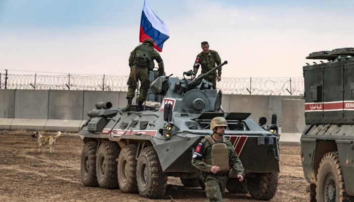 This image shows the Russian troops on an armoured vehicle. — AFP/File