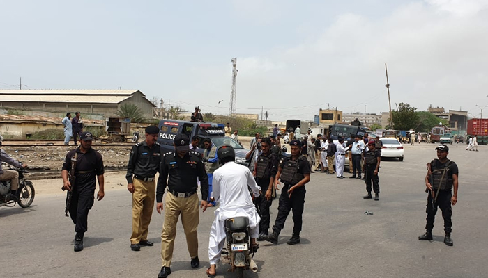 This image released on August 2, 2019, shows Sindh police personnel during a snap-checking in Karachi. — Facebook/Sindh Police