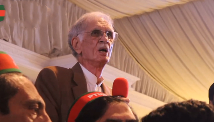 Pakistan Tehreek-e-Insaf-Parliamentarians chairman and former federal defence minister Pervez Khattak speaks during a party gathering in this still taken from a video released on December 6, 2023. — Facebook/PTI-P