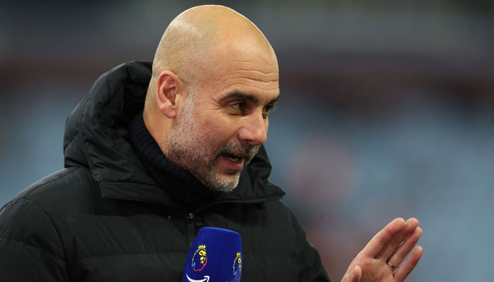 Spanish manager Pep Guardiola gives an interview ahead of the English Premier League football match between Aston Villa and Manchester City at Villa Park in Birmingham, central England on December 6, 2023. — AFP