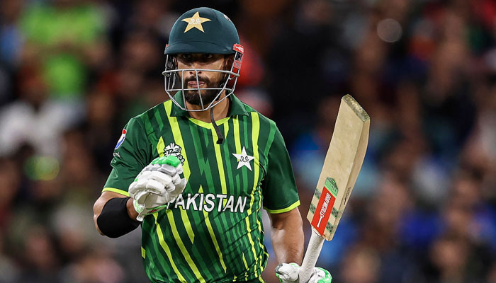 Pakistans Shan Masood raises his bat after passing 50 runs during the ICC mens T20 World Cup 2022 cricket match between India and Pakistan at Melbourne Cricket Ground (MCG) in Melbourne on October 23, 2022. — AFP