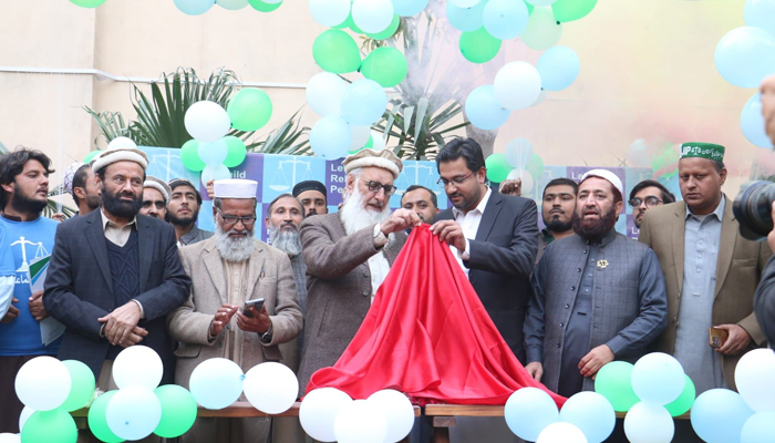 JI provincial president Prof Mohammad Ibrahim Khan (C) during the launching of the election campaign in Peshawar on December 8, 2023. — Facebook/Jamaat-e-Islami KP