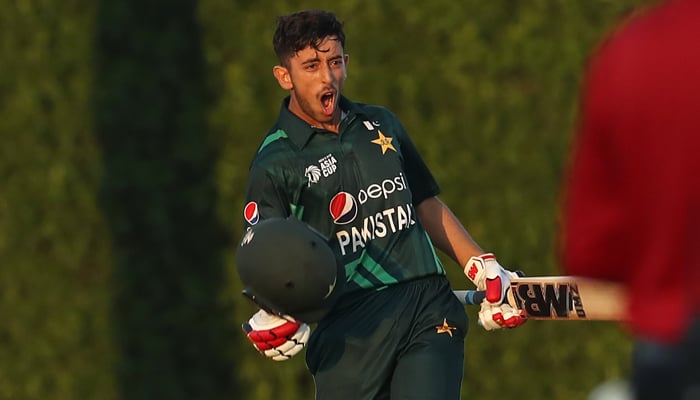 Pakistans Azan Owais celebrates after an unbeaten century at the ICC Academy Ground in the ACC Under-19 Asia Cup against India on December 10, 2023. — X/@TheRealPCB