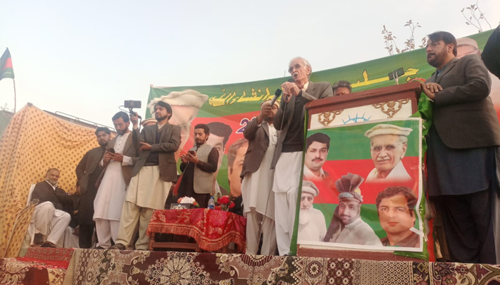 Pakistan Tehreek-e-Insaf-Parliamentarians chairman and former federal defence minister Pervez Khattak addresses a party joining gathering in Jabba Tar and inauguration of elections office in Shahkot on December 10, 2023. — Facebook/PTI-P