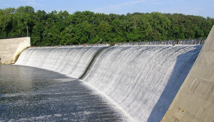 This image shows a stream of water descending in a dam in Pakistan. — AFP/File