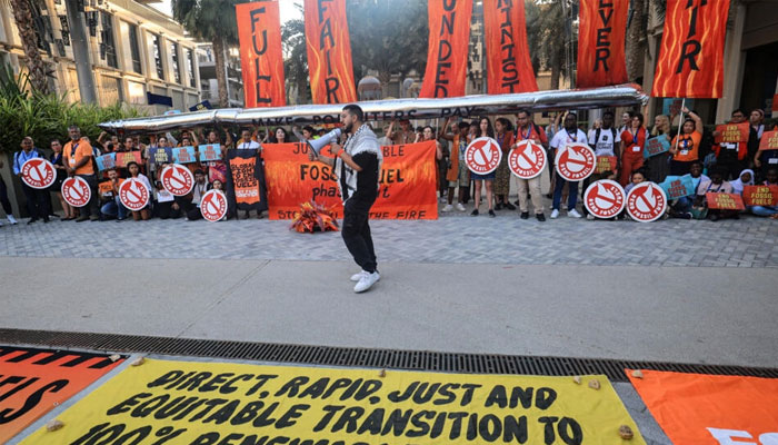 Activists protest against fossil fuels on the sidelines of the COP28 United Nations climate summit in Dubai on December 5, 2023.  . — AFP File