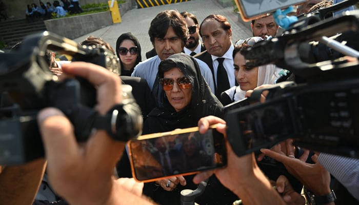 Aleema Khan (C) sister of former PM Imran Khan, speaks with the media outside the High Court in Islamabad on August 28, 2023. — AFP