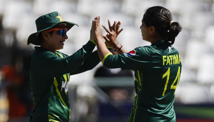 The image released on Feb 21, 2023 shows Fatima Sana celebrating with Nida Dar in T20 World Cup in Cape Town. —ESPNCricinfo