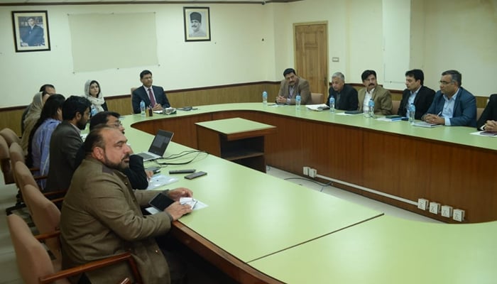 Local Government Secretary Dr Ahmed Javed Qazi chairs a meeting regarding the ‘Ab Gaon Chamkein Ge’ programme on December 14, 2203. — Facebook/Local Government & Community Development Department, Punjab