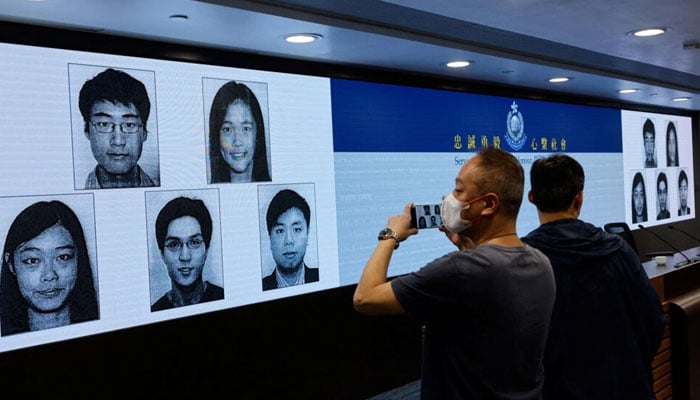 Images of five activists Simon Cheng, Frances Hui, Joey Siu, Johnny Fok, and Tony Choi are displayed during a press conference to issue arrest warrants in Hong Kong, China on December 14, 2023. . — AFP File