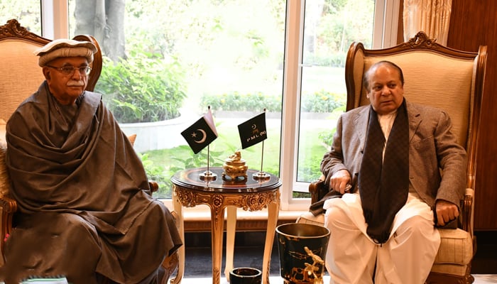 PMLN Quaid Nawaz Sharif (R) looks on during a meeting with Mahmood Khan Achakzai, chief of the PakhtunKhaw Milli Awami Party in Lahore on December 14, 2023. — Facebook/Mehmood Khan Achakzai