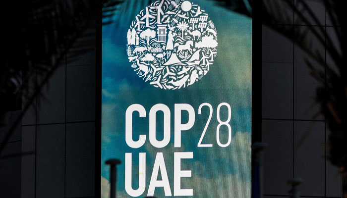 The logo of the United Nations Climate Change Conference COP28 is pictured at Expo City in Dubai on December 12, 2023. — AFP