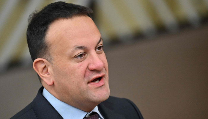 Irelands Prime Minister, Leo Varadkar speaks to the press as he arrives at the European headquarters to attend the European Union summit, in Brussels, on December 15, 2023. — AFP