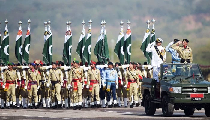 Soldiers march past during a Pakistan Day military parade in Islamabad. —AFP/File