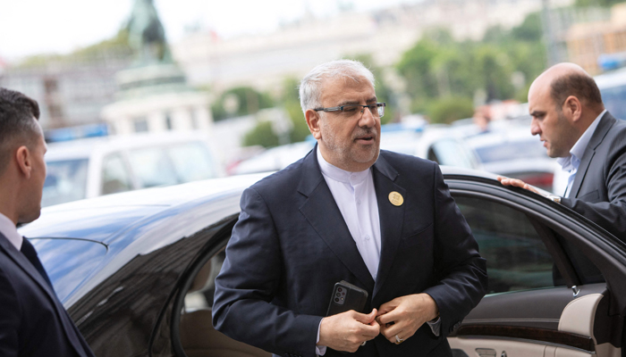 Iran´s Minister of Petroleum Eng Javad Owji (C) arrives at the 8th OPEC International Seminar in Vienna, Austria, on July 5, 2023. — AFP