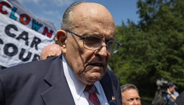 Attorney of former US President Donald Trump, Rudy Giuliani, speaks to the media in Atlanta, Georgia, on August 23, 2023. — AFP