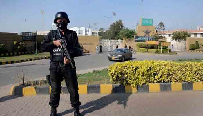 This image shows a police commando standing guard in Karachi. — APP/File
