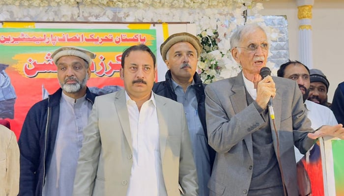 Pakistan Tehreek-e-Insaf-Parliamentarian leader Pervez Khattak speaks during a party gathering in Nowshera on December 22, 2023. — PTI-P