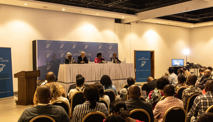 Leaders of the Carter Center election observation team addressed the press in Kinshasa on December 22, 2023. — AFP