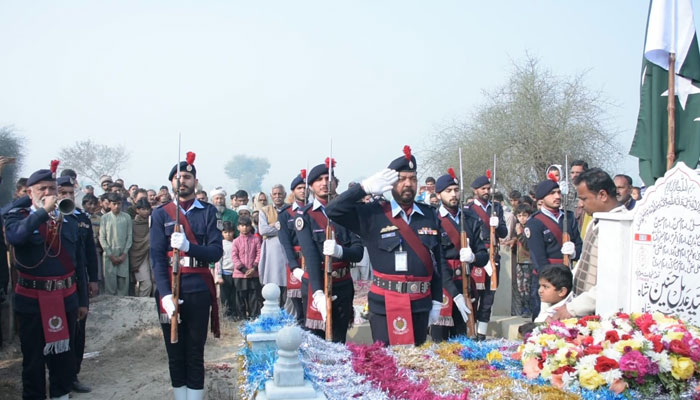 Islamabad Police gives a guard of honor at Alis grave in Islamabad on December 23, 2023. — Facebook/Islamabad Police