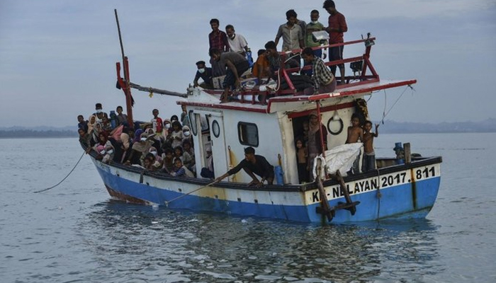 A boat full of refugees can be seen in this image. — AFP/File