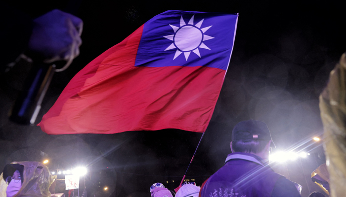 Supporters attend a Kuomintang (KMT) campaign rally ahead of Taiwan´s presidential election in Taipei on December 23, 2023. — AFP