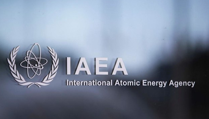 The UN nuclear watchdog IAEA logo can be seen in this image written on its HQs. — AFP/File