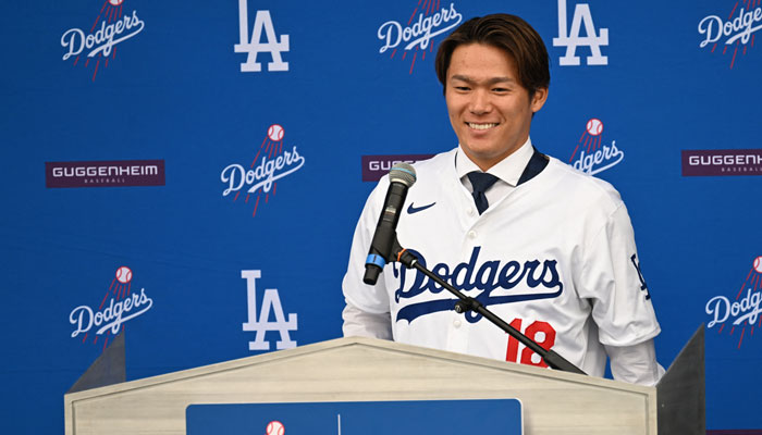 New Los Angeles Dodger Japanese pitcher Yoshinobu Yamamoto, speaks during his introductory press conference at Dodger Stadium in Los Angeles on Wednesday, Dec. 27. — AFP