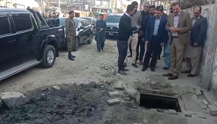 Commissioner Rawalpindi Division Liaquat Ali Chattha (R) reviews the reconstruction work of Asghar Mall Road. — Facebook/Commissioner Rawalpindi Official